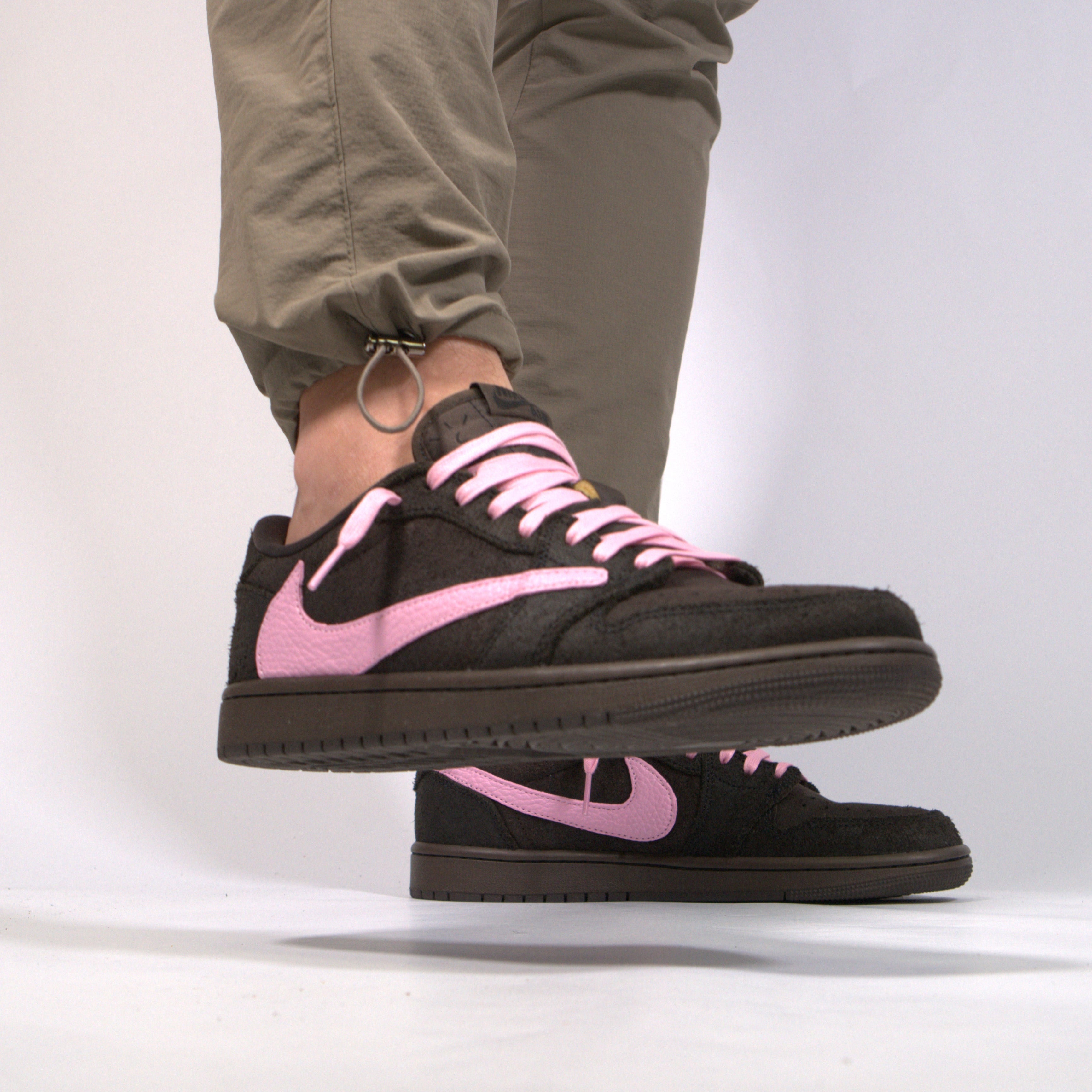 travis scott pink and brown shoes